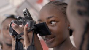 Lilian, a 19-year-old orphan studying photography as she recovers from abuse