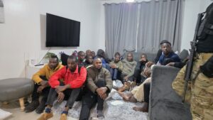 Victims of the scam after being rounded by police.