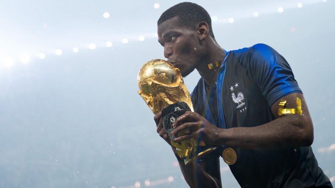 MOSCOW, RUSSIA – JULY 15: Paul Pogba celebrates with the World Cup trophy after France defeated Croatia in the 2018 FIFA World Cup Final at Luzhniki Stadium. [Photo/Getty Images]
